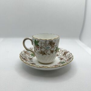 Minton Arbor tea cup and saucer - Fife multi-colored leaves and gold trim